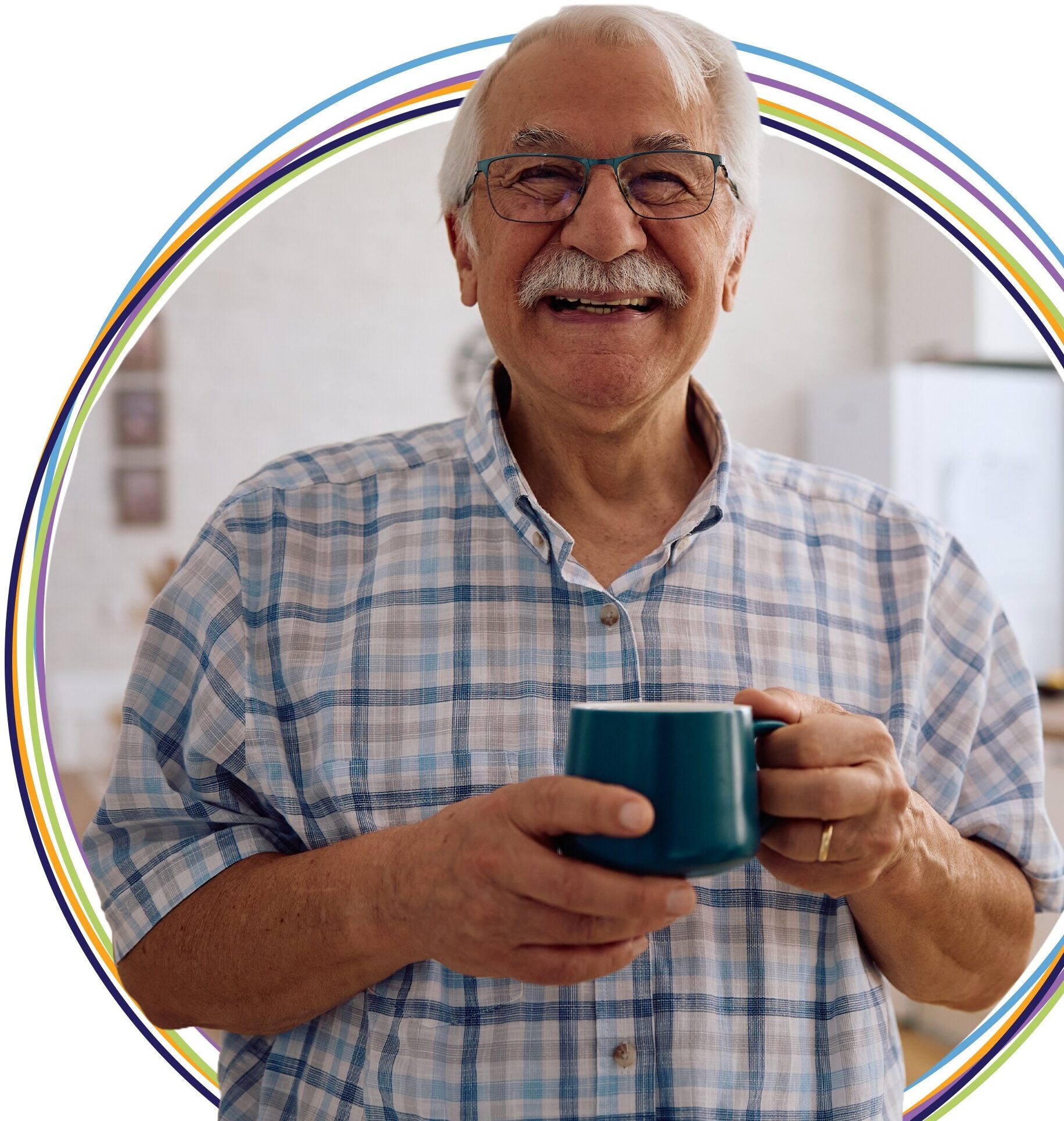 Smiling elderly man holding a coffee mug