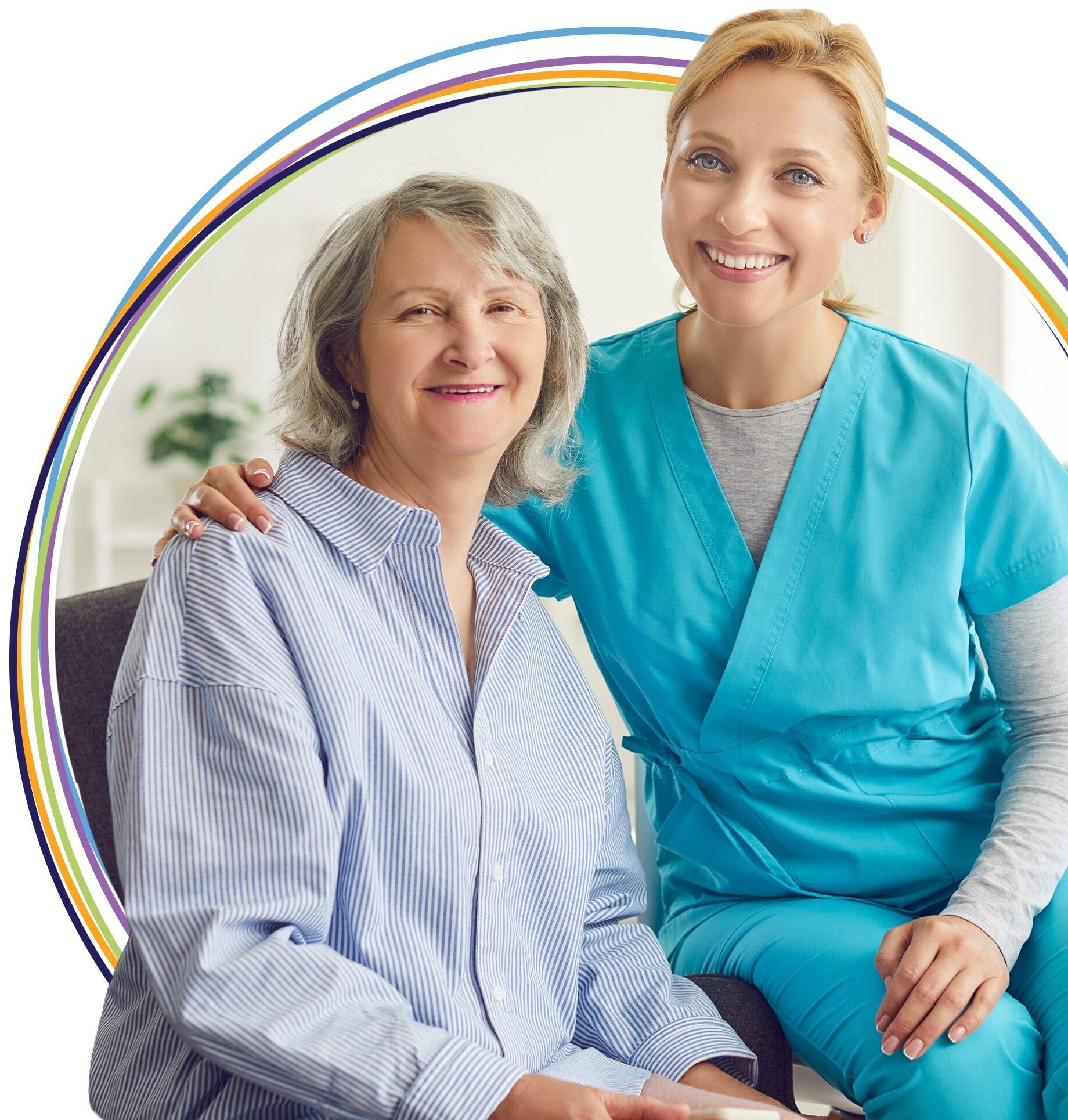 Smiling senior woman with caregiver in scrubs