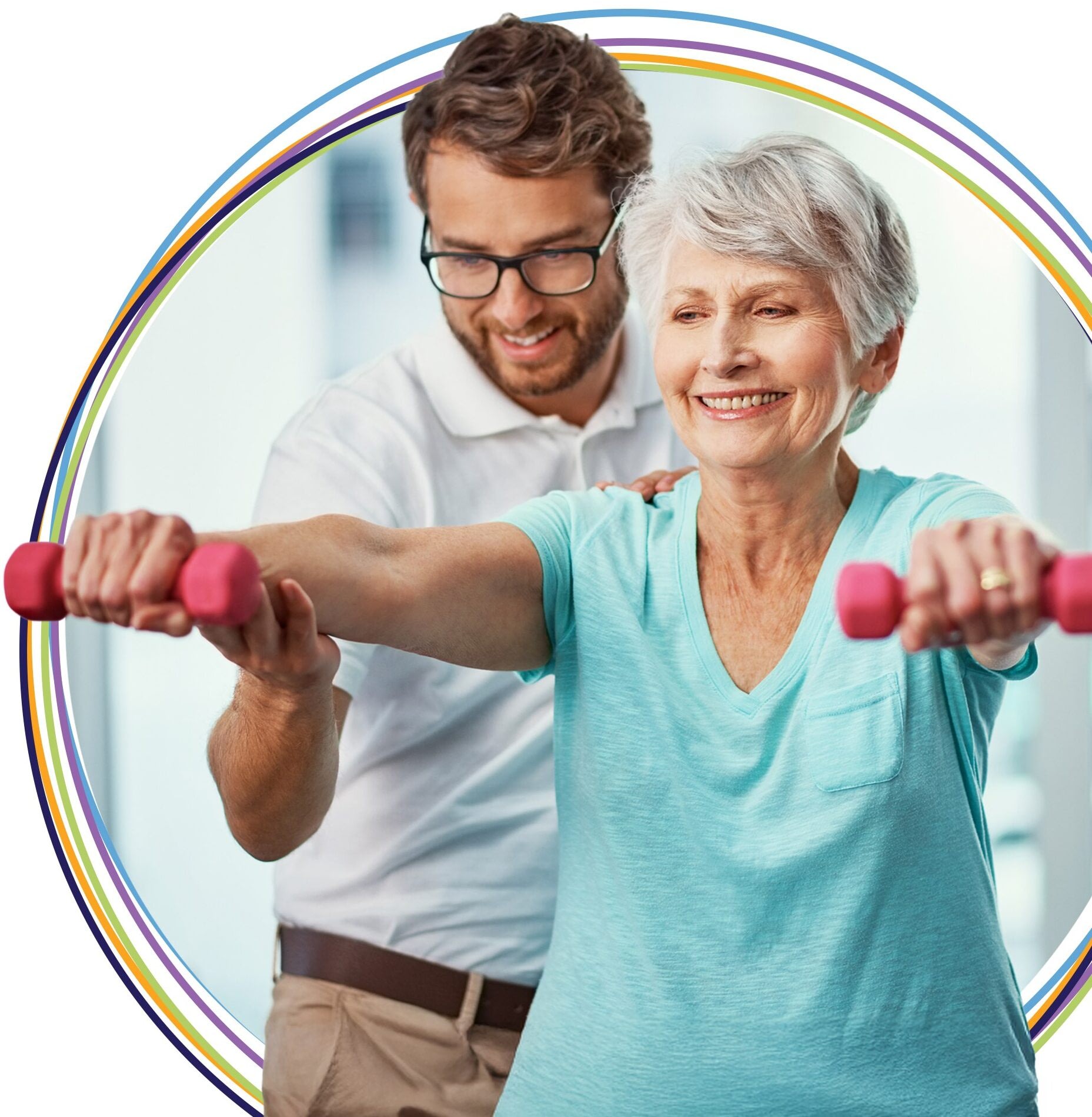 Senior woman lifting dumbbells with trainer assistance