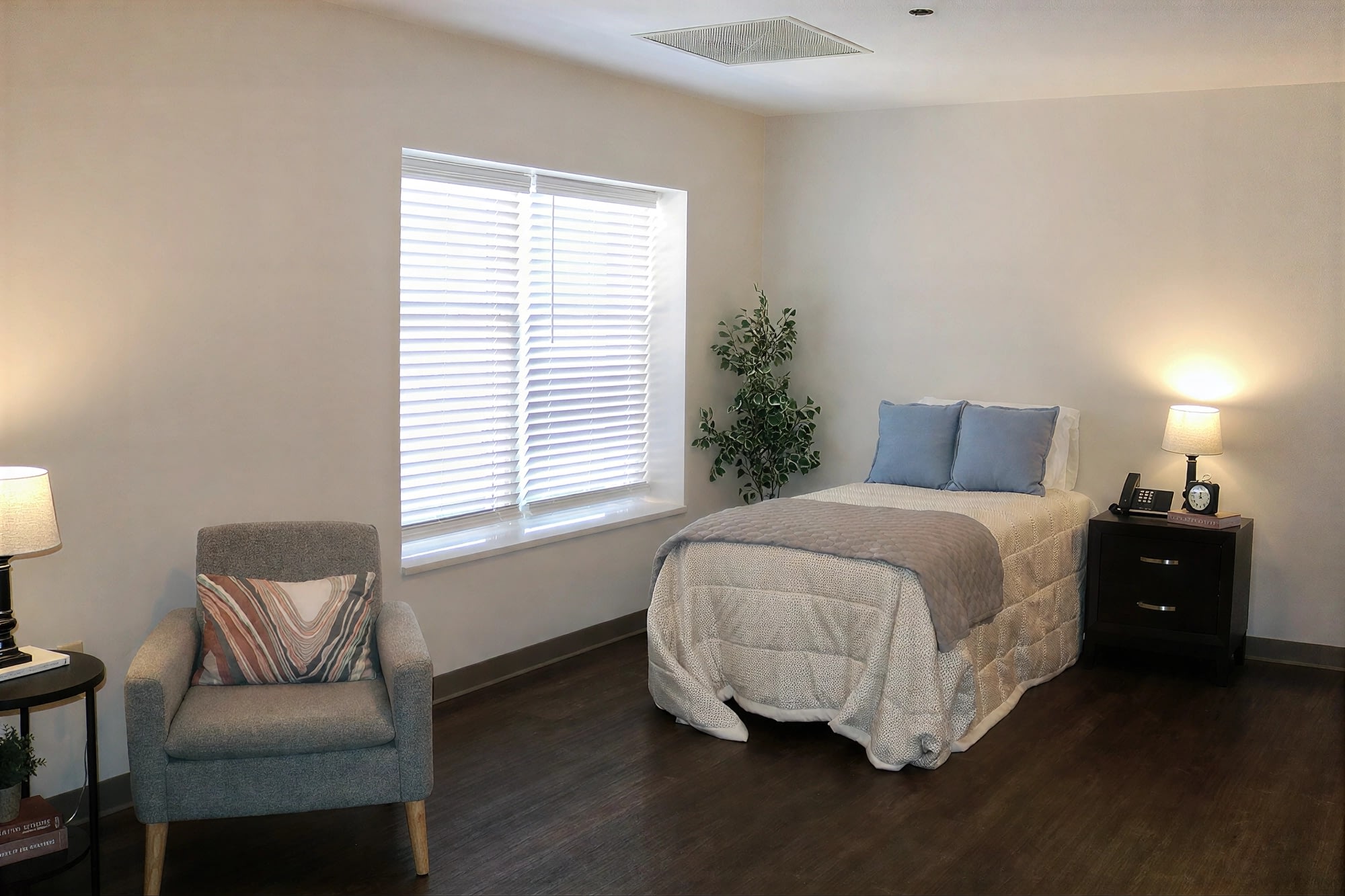 Cozy bedroom with single bed and armchair