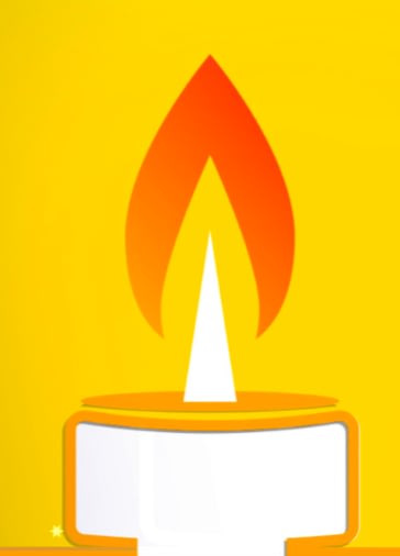 Lit candle with orange flame on yellow background