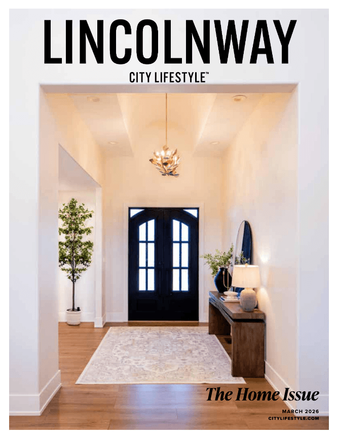 Modern foyer with black double doors and chandelier