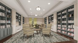 Cozy modern library with armchairs and built-in bookshelves