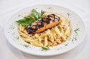 Grilled glazed salmon over creamy penne pasta
