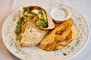 Pita wrap with chips and creamy dip