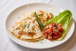 Cheese quesadillas with tomato salsa and lettuce