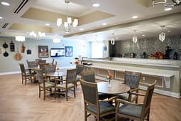 Modern dining room with tables and bar counter