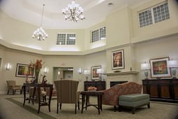Elegant lounge with fireplace and chandeliers