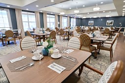 Elegant dining room with neatly set tables