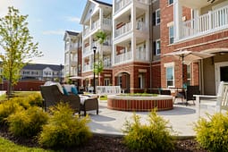 Apartment courtyard with seating and fire pit