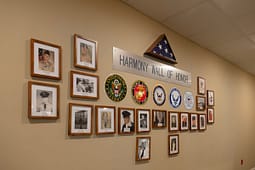 Harmony Wall of Honor with military portraits