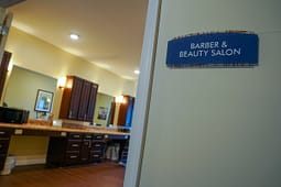 Barber and beauty salon interior with styling stations