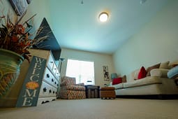 Cozy living room with sofa and welcome sign