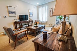 Cozy living room with wooden furniture and TV