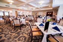 Elegant dining room with neatly set tables