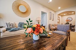 Cozy living room with flowers on wooden table