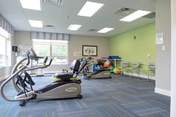 Physical therapy gym with recumbent exercise machines