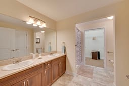 Modern bathroom with double sink vanity and mirror