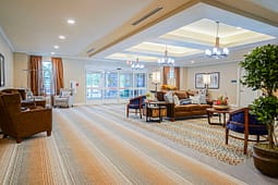 Spacious, well-lit lobby with comfortable seating area