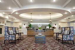 Elegant reception lobby with seating and front desk