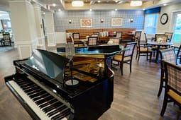 Grand piano with microphone in elegant lounge
