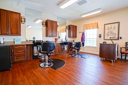 Modern hair salon interior with styling chairs
