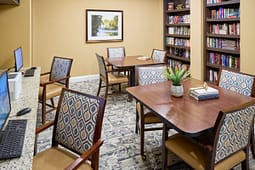 Small library study room with tables and bookshelves