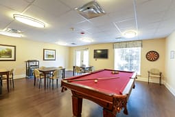 Recreation room with pool table and seating