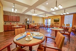 Senior living community dining room with tables