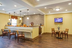 Cozy community lounge with kitchen island and seating