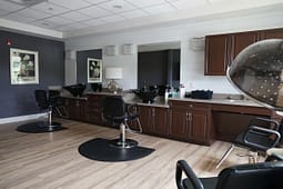 Modern hair salon interior with styling chairs