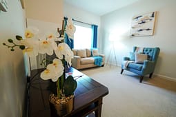 White orchid on table in modern living room