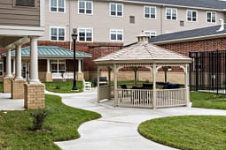 Gazebo in landscaped courtyard of apartment complex