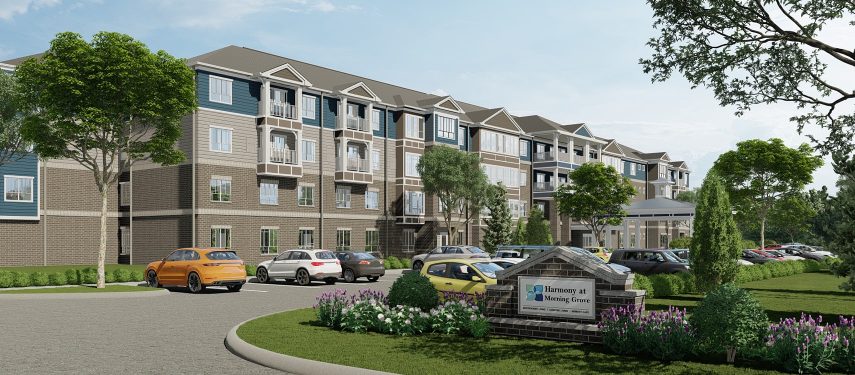 Modern apartment complex with landscaped entrance sign