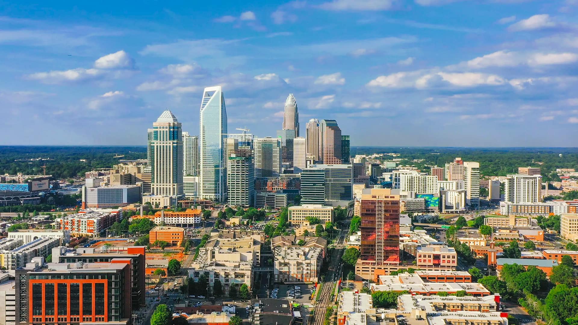 Charlotte North Carolina skyline under blue sky
