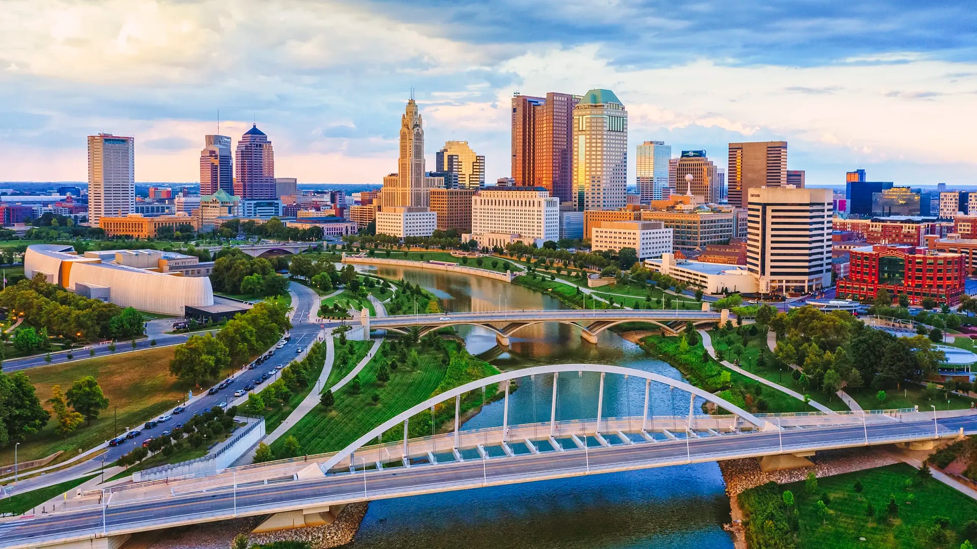 Downtown skyline with river and arched bridges