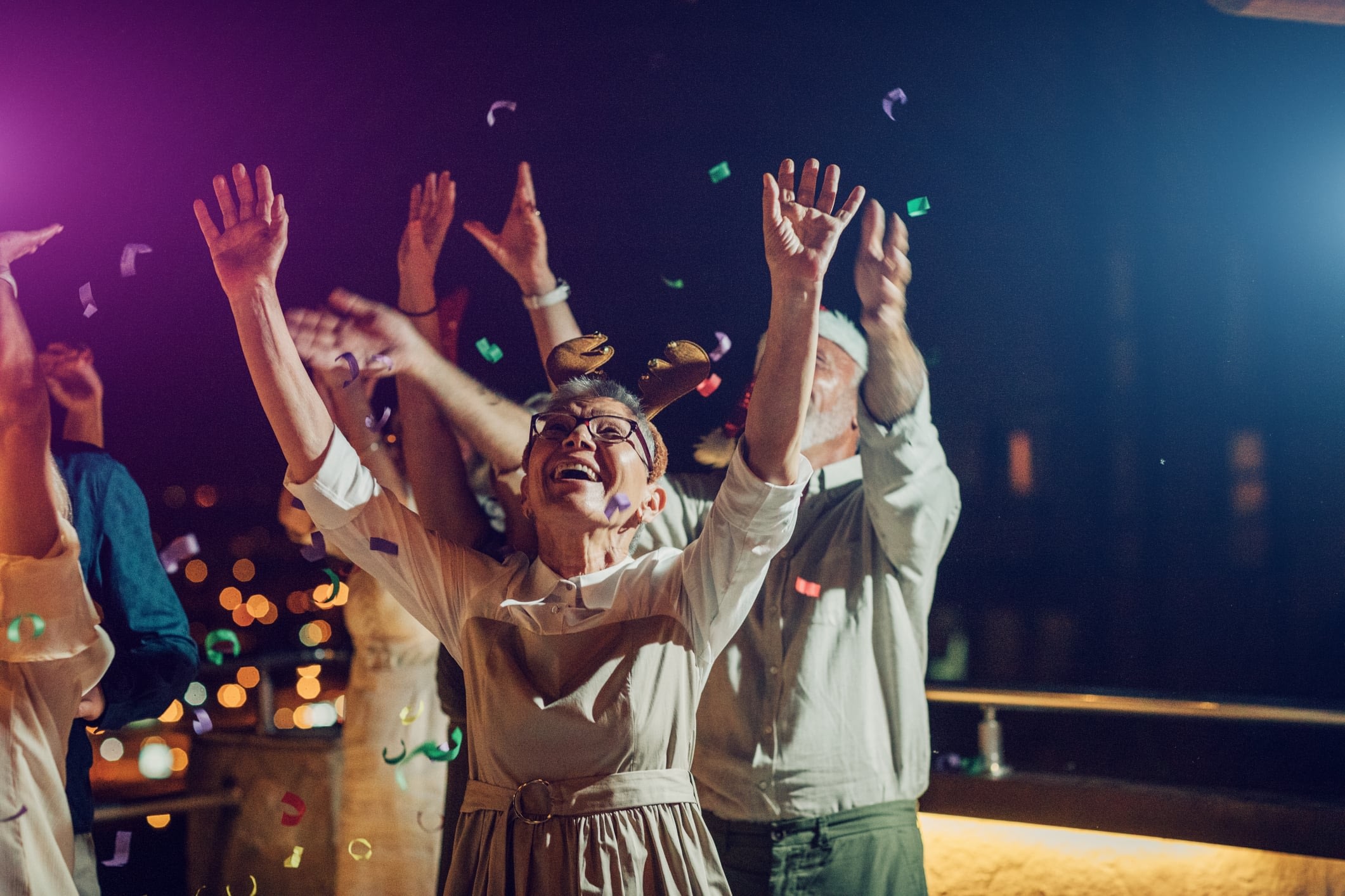 Group of senior friends having New Year’s Eve party
