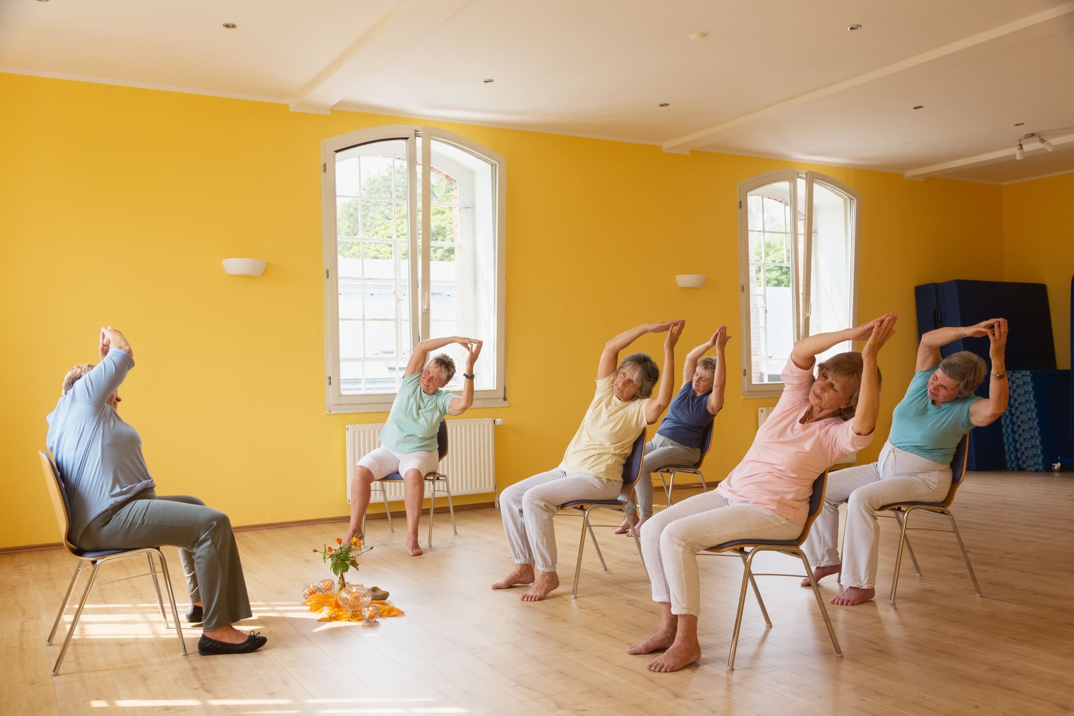 Senior women in a chair yoga class at Brightwater Senior Living of Tuxedo in Winnipeg, Manitoba