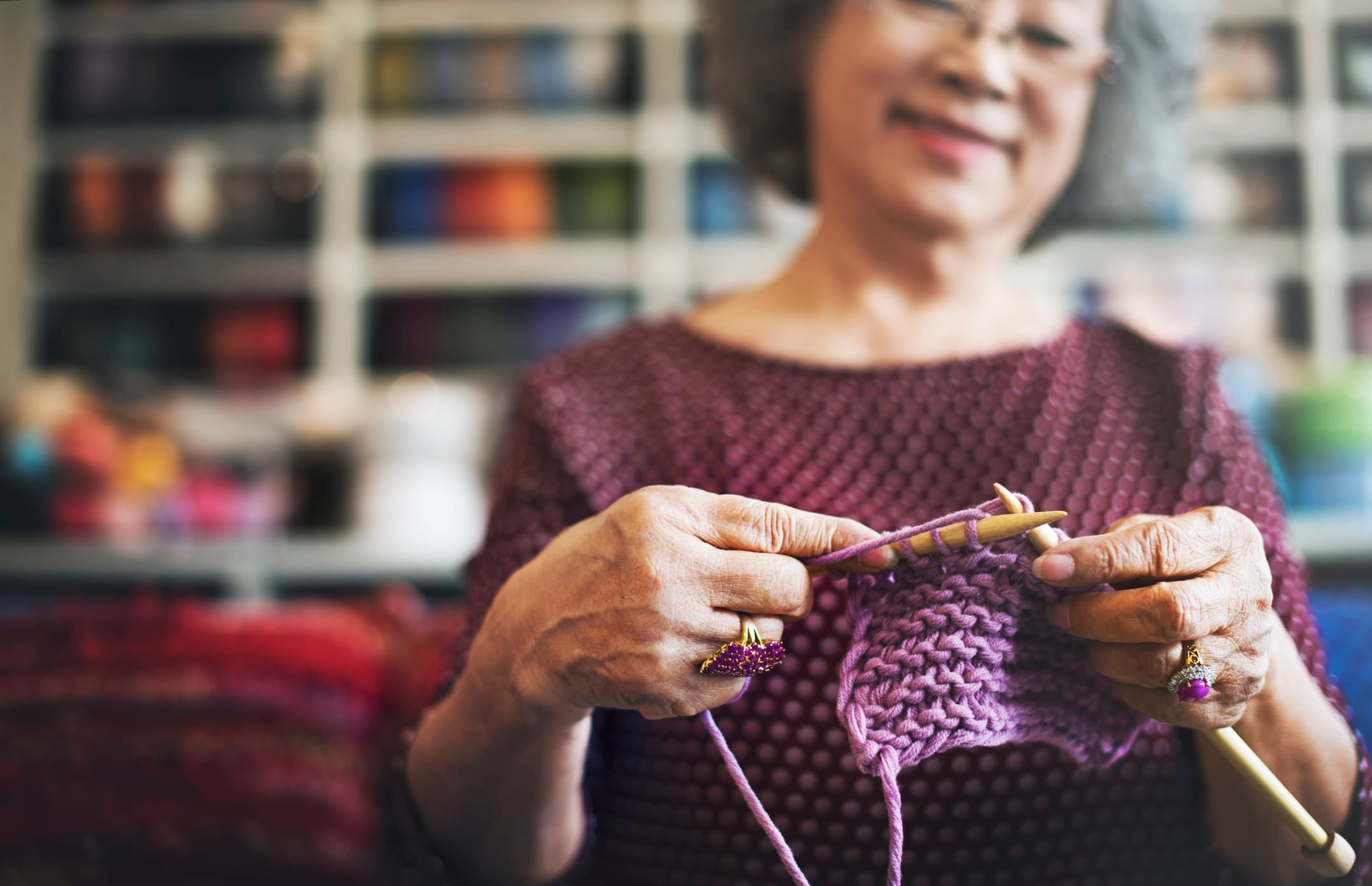 A woman knitting.
