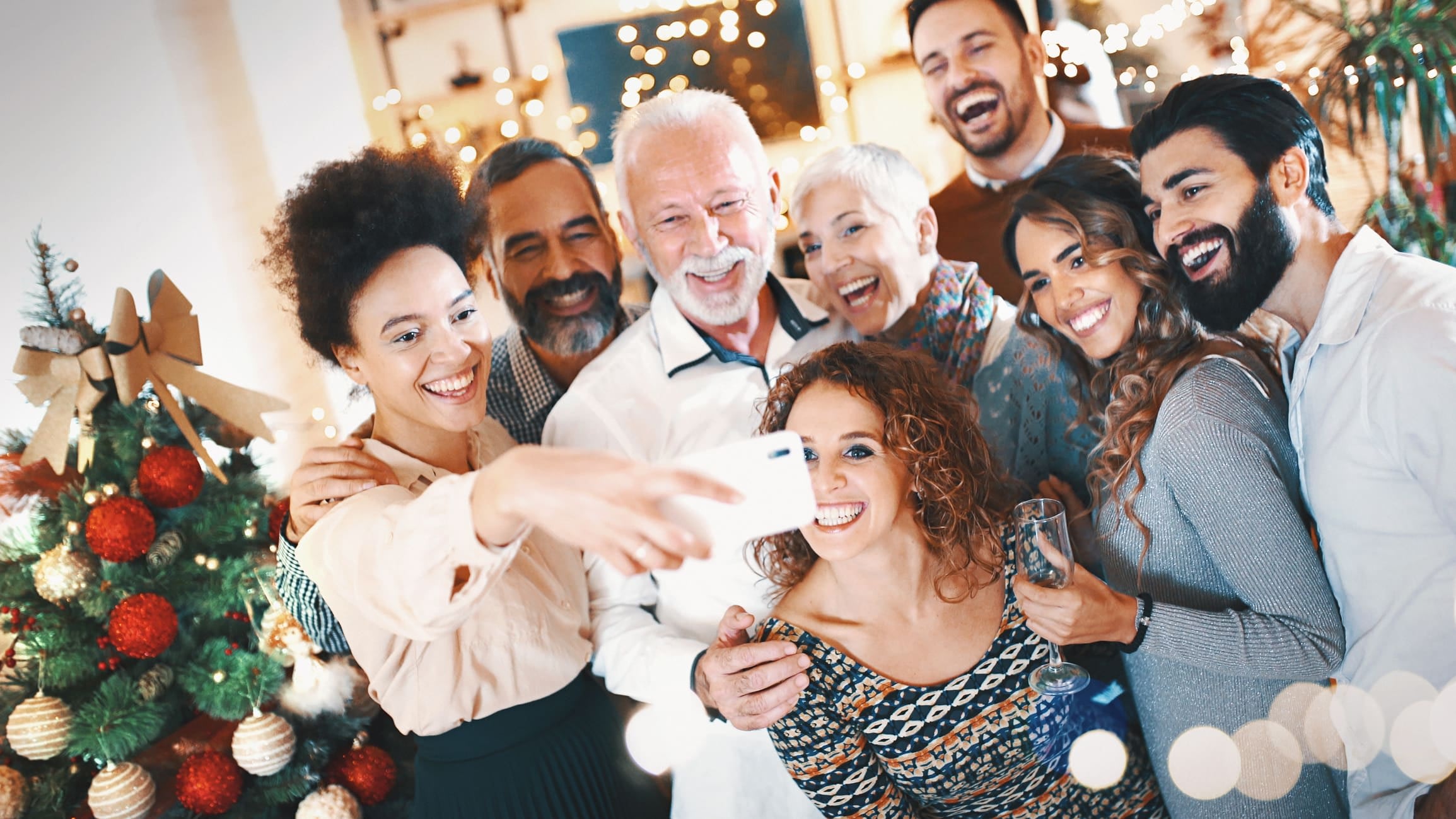 A multi-generation family celebrating Christmas at home