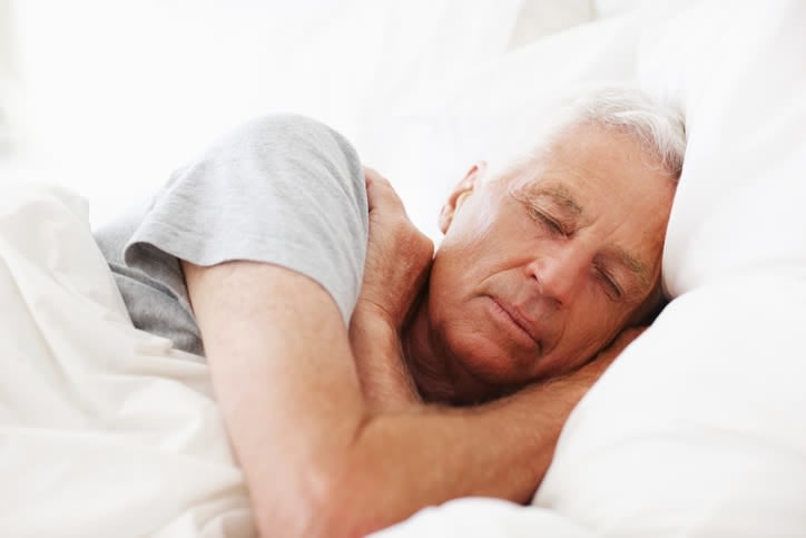 A senior resident sleeping at Brightwater Senior Living