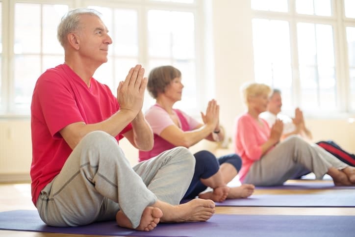 Two men and two women doing exercises at Brightwater Senior Living