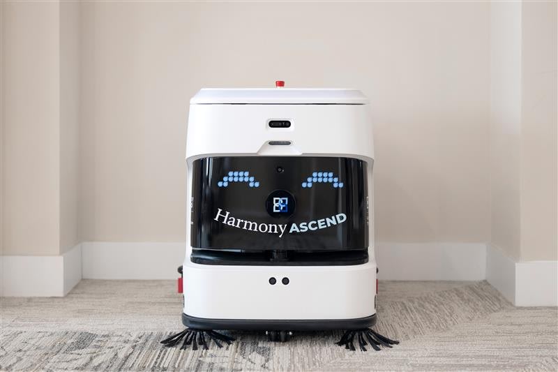 Harmony Ascend autonomous cleaning robot on carpeted floor