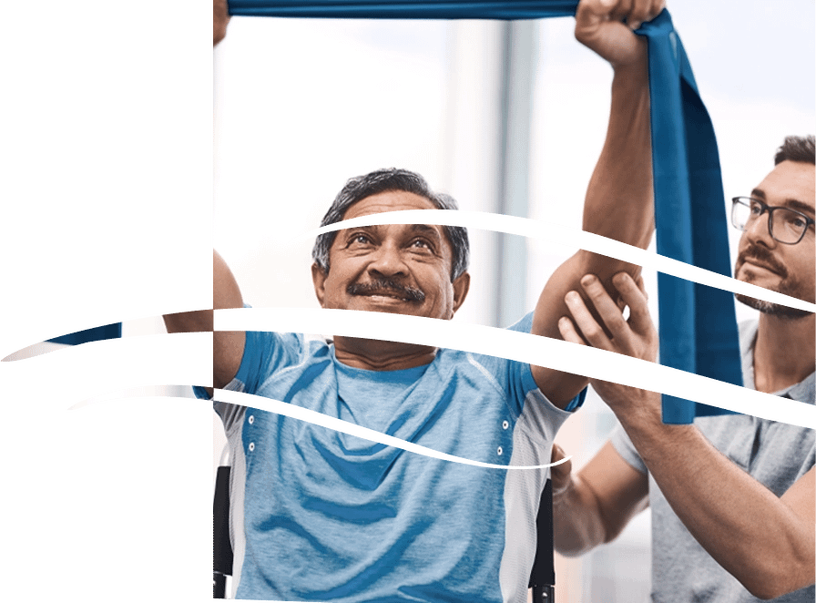 Senior man exercising with resistance band and therapist